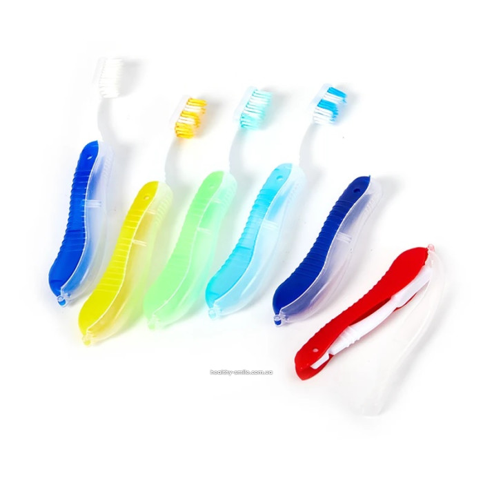 Travel folding toothbrush, yellow